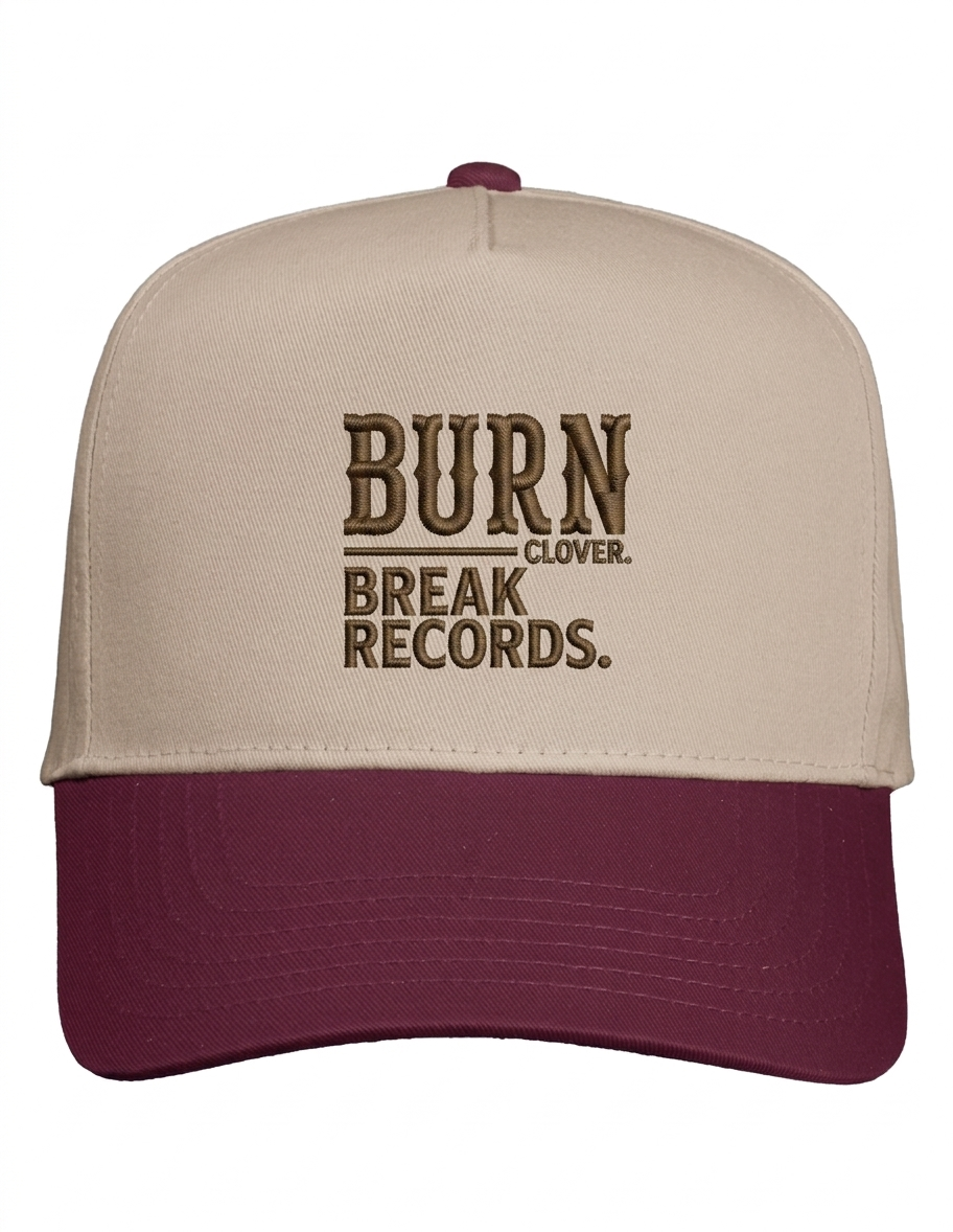 Apliiq Burn Clover hat featuring a stylish design with a green clover illustration on a casual hat front.