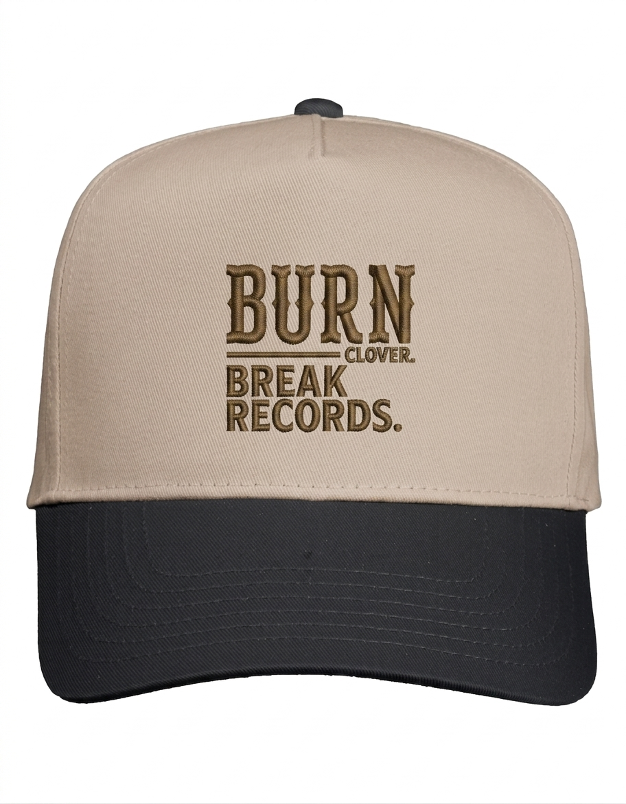 Apliiq Burn Clover hat featuring a stylish black cap with a colorful burn clover design on the front.
